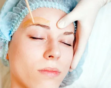 Eyebrows waxing hair removal
